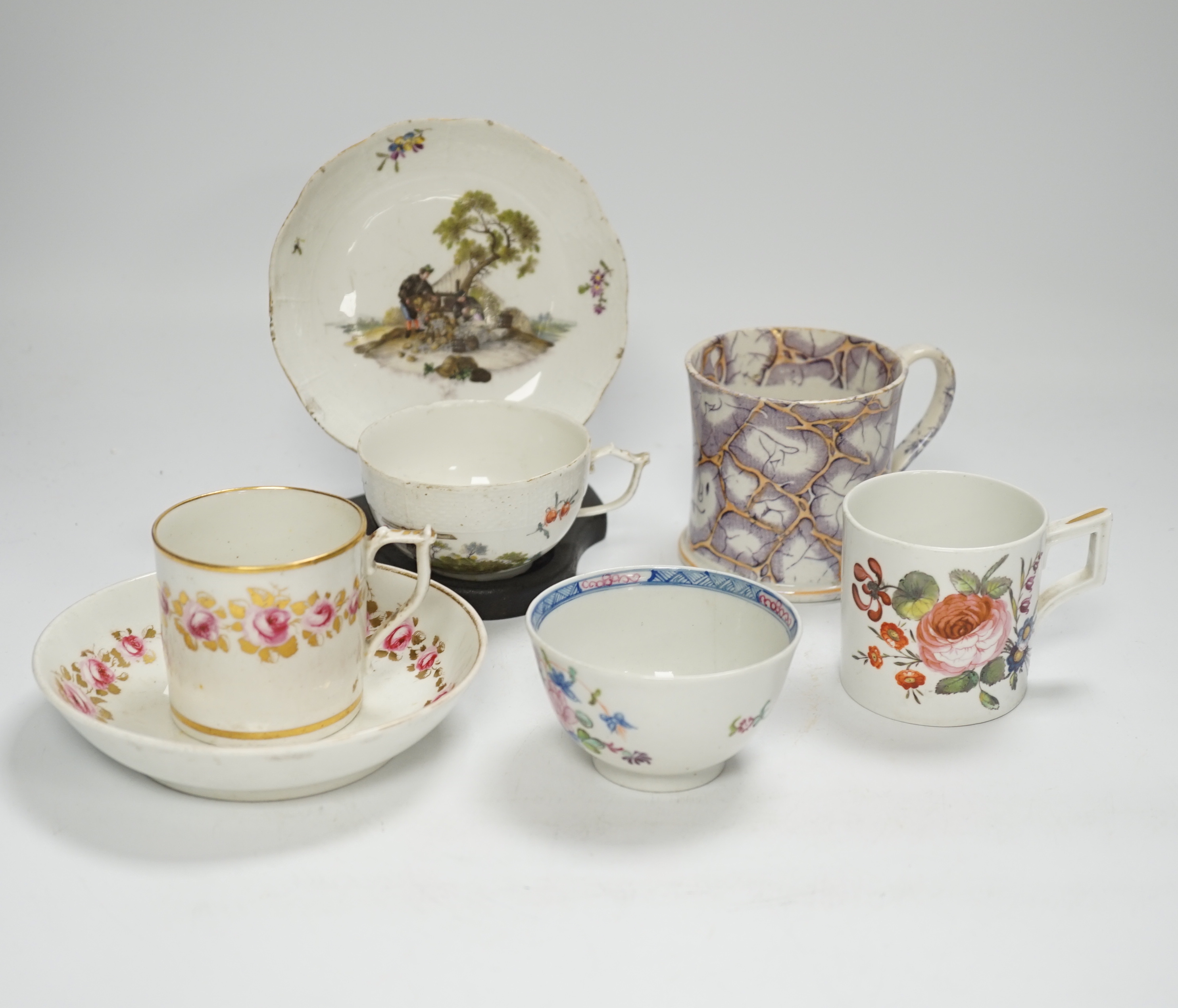 Two Derby porcelain coffee cans and one saucer, a tea bowl, a pearlware mug and a mid 18th century Meissen cup and saucer, tallest mug 8cm high